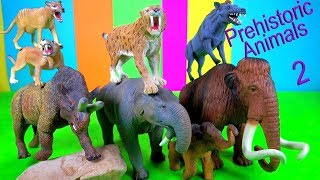 NEW Prehistoric Animals MAMMOTH SMILODON  fun video for kids [upl. by Aevin942]