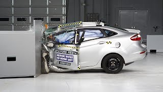 2014 Ford Fiesta sedan driverside small overlap IIHS crash test [upl. by Yrebmik]