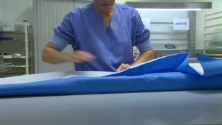 How to Fold Sterilisation Wrap Parallel Packaging Method [upl. by Dyanne]