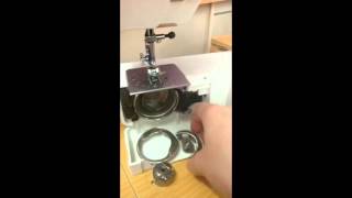 How to pull apart and reassemble the bobbin case area on a front loading sewing machine [upl. by Wyn]