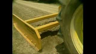 Spreader Grading road grader [upl. by Ruttger]