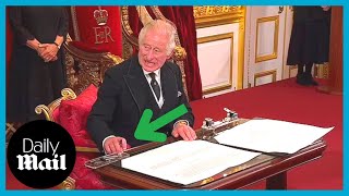 Moment King Charles III furiously motions for aide to move ink pot as he signs proclamation [upl. by Orlantha]