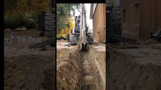 Digging a trench for a buried cable feeder for a shop [upl. by Nacul291]