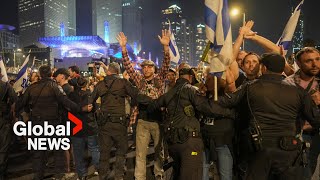 Israeli protesters flood Tel Aviv streets after Netanyahu fires Gallant [upl. by Dayir]