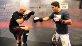 Muay Thai Technique of the Week  Kick Feint to Back Leg Sweep  Revgear [upl. by Etsirk]