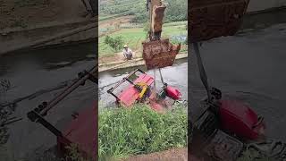 The process of salvaging an agricultural vehicle that fell into the water [upl. by Corabel]