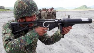 US Philippine Marines NonLethal Weaponry Taser Riot Gun Stingball Grenades [upl. by Rubetta80]