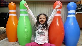 Playing with Giant Inflatable Bowling Pins for children HZHtube Kids Fun [upl. by Attenal93]