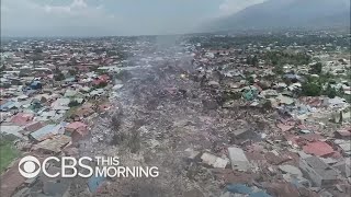 Indonesia earthquake tsunami Rescue crews race to save survivors [upl. by Enoj]