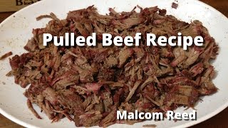 Pulled Beef Sandwich  Smoked Chuck Roast Recipe with Malcom Reed HowToBBQRight [upl. by Atinehs344]