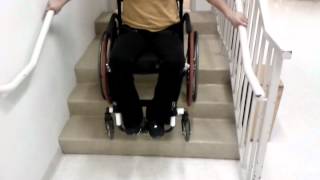 How To Climb Stairs in a Wheelchair Using Handrails [upl. by Aggappora]