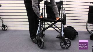 Using a Travelite Lightweight Folding Travel Wheelchair in a Bag [upl. by Columba221]