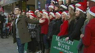 Military Wives Choir sing Wherever You Are live on Oxford Street London [upl. by Anikat]