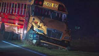 Rome school bus overturns into power lines after crash multiple students injured [upl. by Suitangi580]