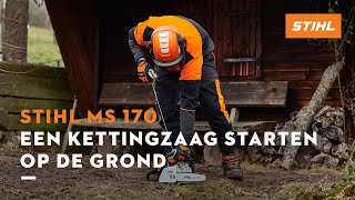 Een kettingzaag starten op de grond  STIHL MS 170 [upl. by Yrek]