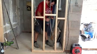 How to make a partition wall with door how to build a stud wall [upl. by Tonneson]