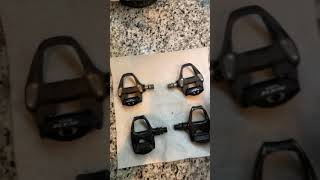 SHIMANO 105 pedals VS SHIMANO Tiagra pedals [upl. by Coralyn]