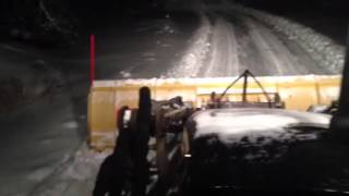 Cat backhoe plowing snow [upl. by Rooke]