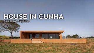 RammedEarth and Wood Retreat A Sustainable Hilltop House in Cunha [upl. by Gorrono533]