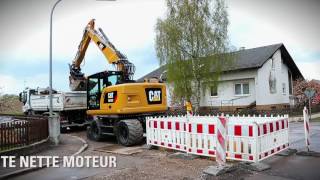 Demo Hydrauliques Sur Pneus A Rayon Court Cat® M315F amp M317F [upl. by Zelazny]