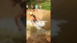 Surfer attempts to ride a river breach shorts [upl. by Pegeen]