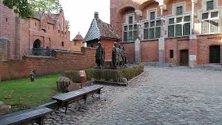 guide to malbork castle green route main entrance and courtyard Poland solo travel part 4 [upl. by Eirek97]