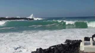 Large surf breaking across the Honokohau Harbor entrance [upl. by Enoob]