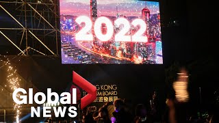 New Years 2022 Hong Kong skyline lights up with fireworks as orchestra performs [upl. by Anelav]