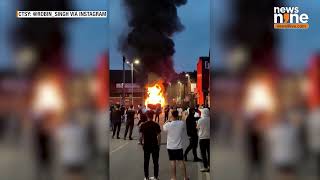 UK Riots Chaos in Leeds as Angry Rioters Set Bus Ablaze and Overturn Police Car  News9 [upl. by Hasseman]