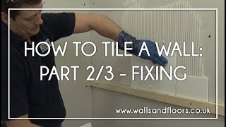 How To Tile A Wall  23  Fixing The Wall Tiles [upl. by Anitrak566]