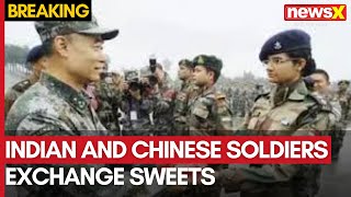 Indian and Chinese Soldiers Exchange Sweets at ChushulMoldo Border for Diwali  NewsX [upl. by Nivaj307]