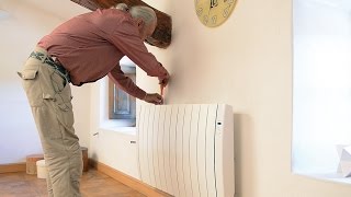 Installer un radiateur électrique à chaleur douce fluide caloporteur  Bricolage avec Robert [upl. by Shanna]