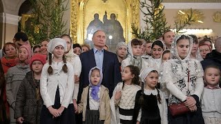 Putin celebrates Christmas with orthodox Christians in St Petersburg [upl. by Anifesoj]