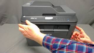 MFCL2740DW Comment remplacer la cartouche de toner [upl. by Serafine]