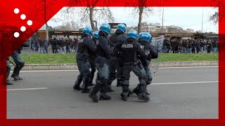 Derby LazioRoma tensione lancio di bottiglie verso la polizia [upl. by Tteragram]