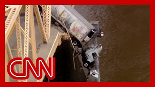 Truck dangles off bridge after crash See the harrowing rescue of driver [upl. by Egiaf]