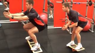 How To Do The Extreme Balance Board Squat [upl. by Dena]