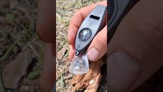 Starting a fire with a magnifying glass bushcraft survival outdoors [upl. by Scammon865]