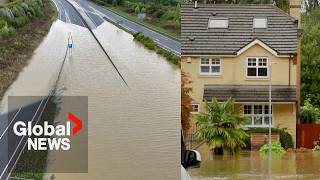 UK flooding Heavy rains inundate parts of Britain wash out roads [upl. by Willyt]