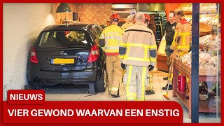 Auto rijdt dwars door pui van bakkerij in Uchelen vier gewonden waarvan een ernstig [upl. by Ehr439]