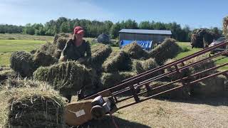 How to load square bales on the hay elevator [upl. by Eiramnwad721]