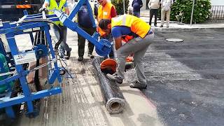 VAF  Asphalt reinforcement grid installation [upl. by Goulet]