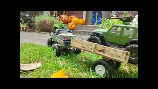 The WPL C241 truck towing a trailer with the SCX24 Gunner through some mudrcfun mud 4wd [upl. by Eznyl]