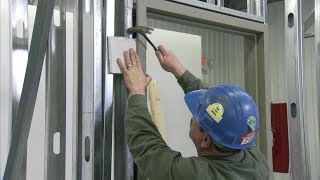 How to Install a Steel Door Frame in Steel Stud Construction  Steel Door Institute [upl. by Scrivenor106]