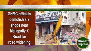 GHMC officials demolish six shops near Mallepally X Road for road widening   3pm  08Oct2024 [upl. by Suolevram]