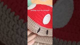 Sew eyes on a beanie 👀 shorts crochet diy beanie kopiah handmade [upl. by Iloj]