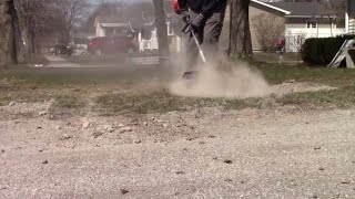 Using Echo Pas 225 and paddle broom attachement cleaning up a yard [upl. by Demmer]