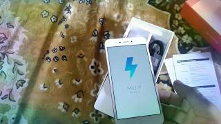 Unboxing Redmi 5A better than 10 or DTenor D amp first switch on amp installation of MIUI9 [upl. by Ahsinert]