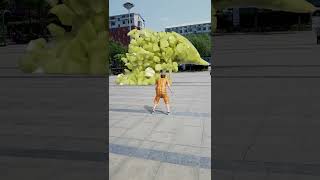 Playing football and smashing the yellow wax figure of the flatbilled duck in the square [upl. by Ainollopa513]