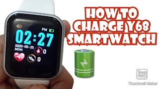 HOW TO CHARGE Y68 SMARTWATCH  ENGLISH [upl. by Ayotas439]